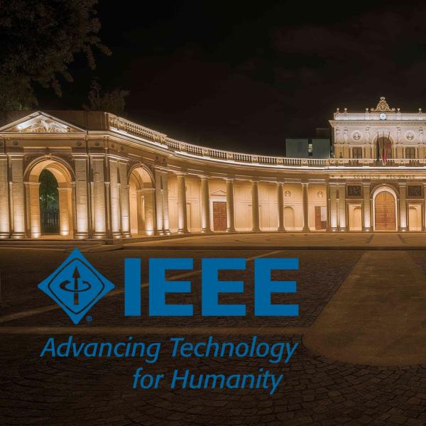 Image of the Palazzo dell’Emiciclo in Aquila with the logo of the IEEE